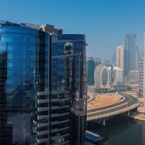 فندق Radisson Blu Hotel, Canal View, دبي